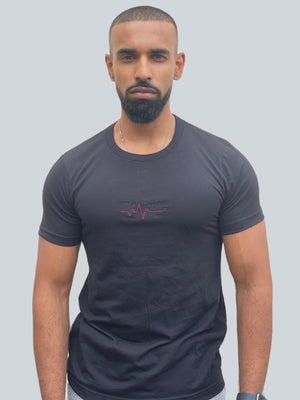 Open image in slideshow, Drake look a like modelling wearing a black tight Supreme Unisex Heartbeat T-shirt showing off his muscles
