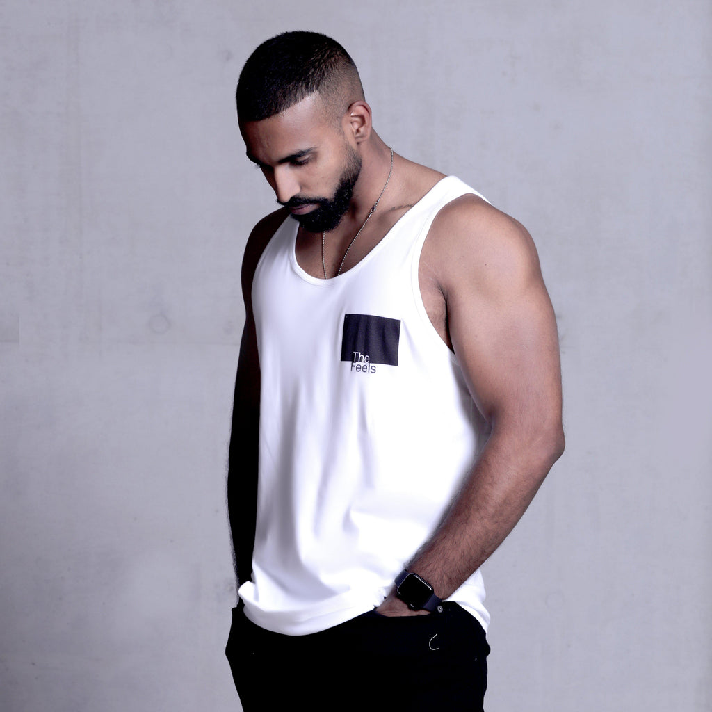 drake look a like modelling wearing Supreme Mens White Muscle Singlet with ying yang design showing off his muscles