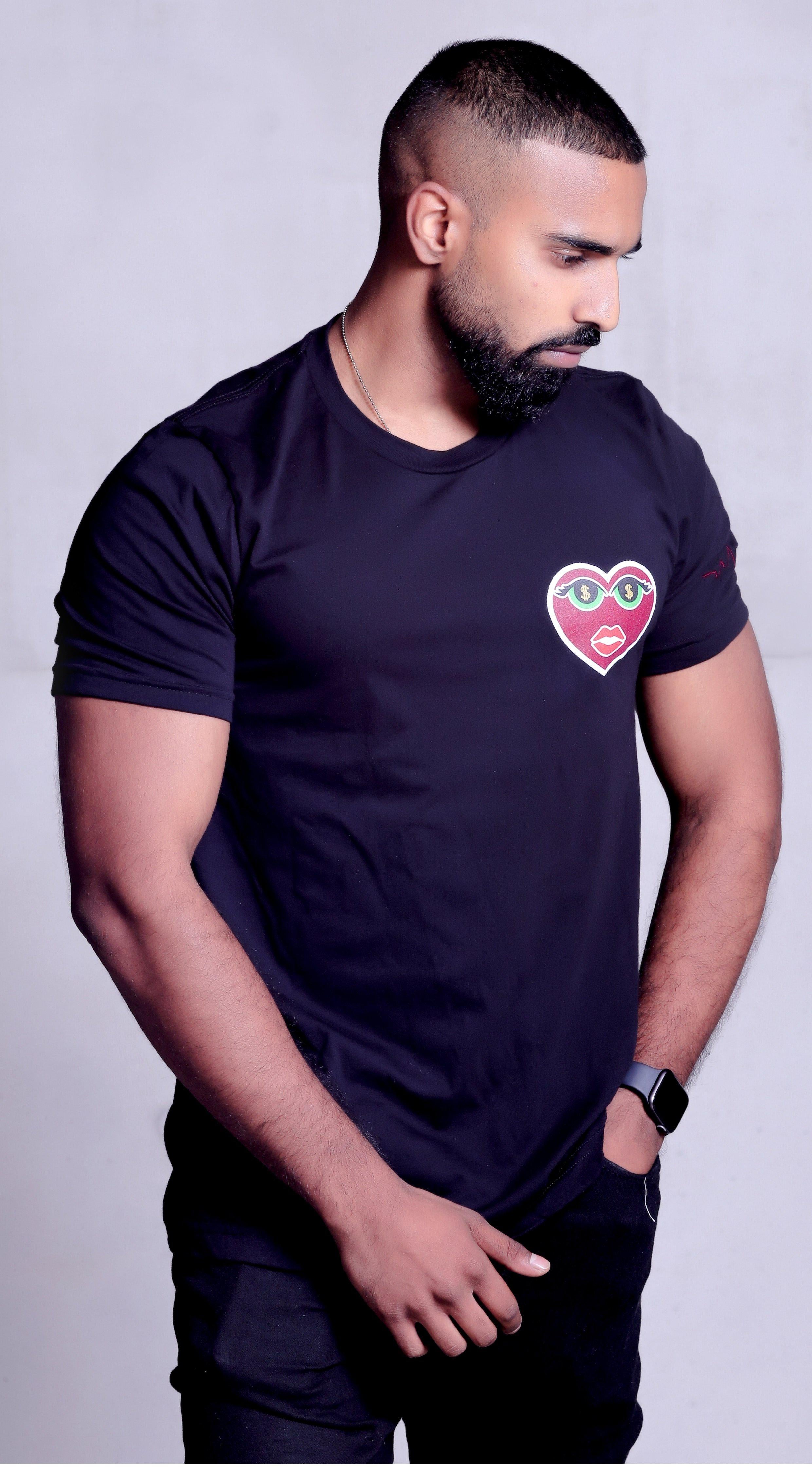 Drake look a like is modelling showing off his muscles wearing Unisex Money Eyes Black T-shirt