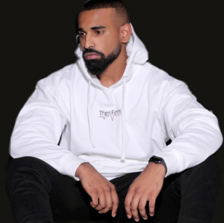Handsome drake look a like modelling wearing Supreme White Heartbeat Fleece Hoodie and black ksubi jeans to match
